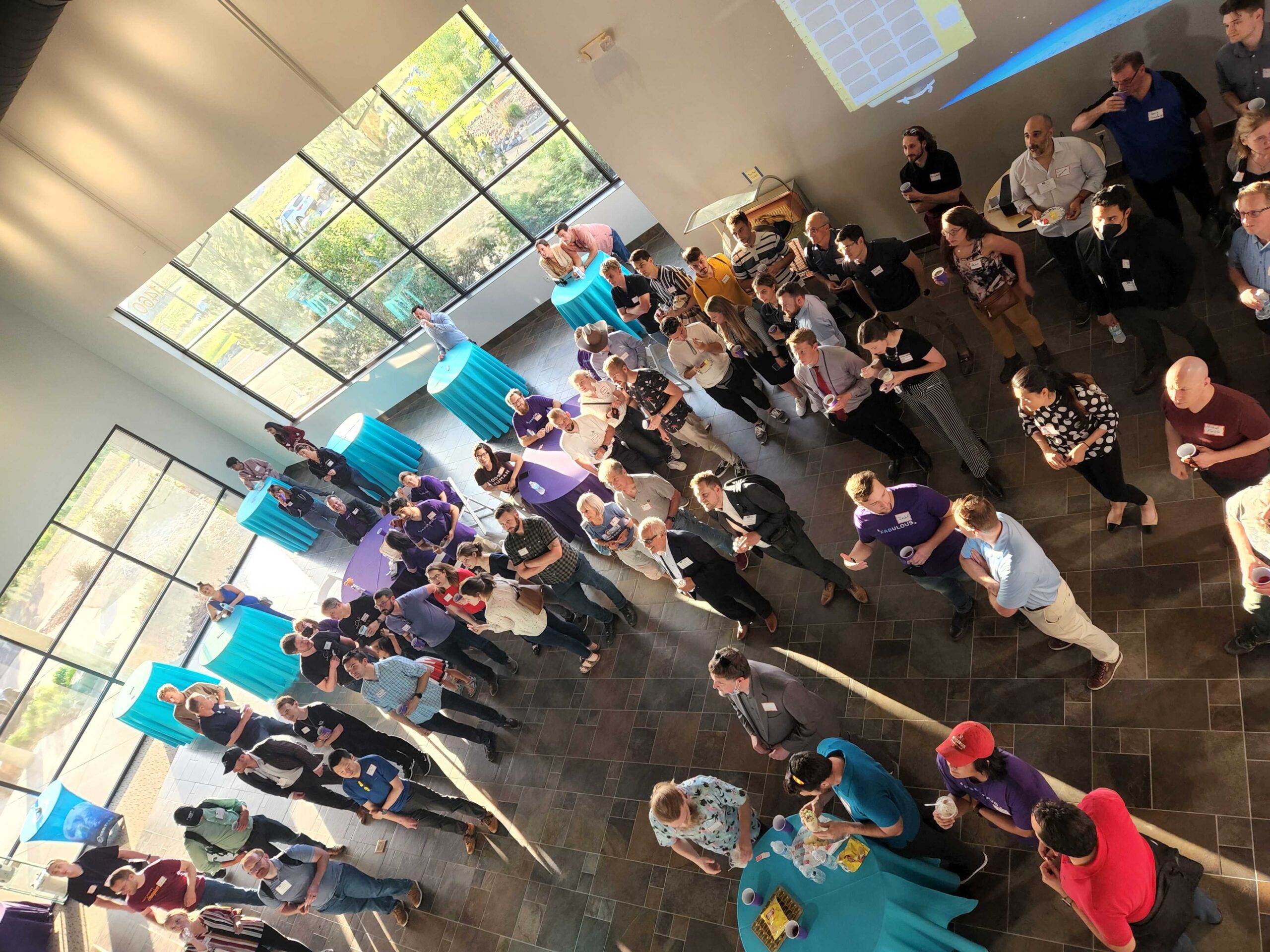 Birds eye view of summer open house in Orbit Fab lobby