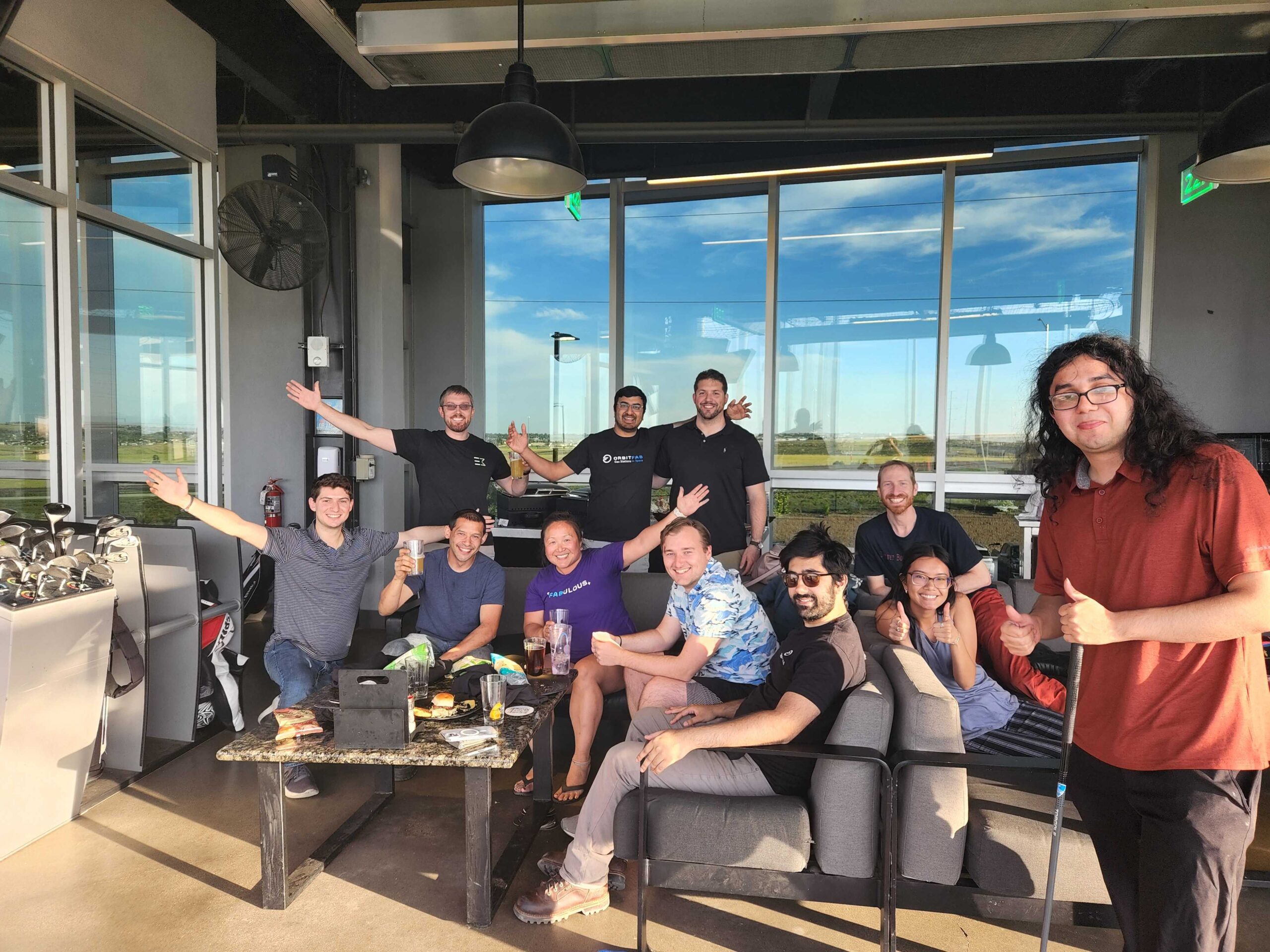 group photo at Top Golf