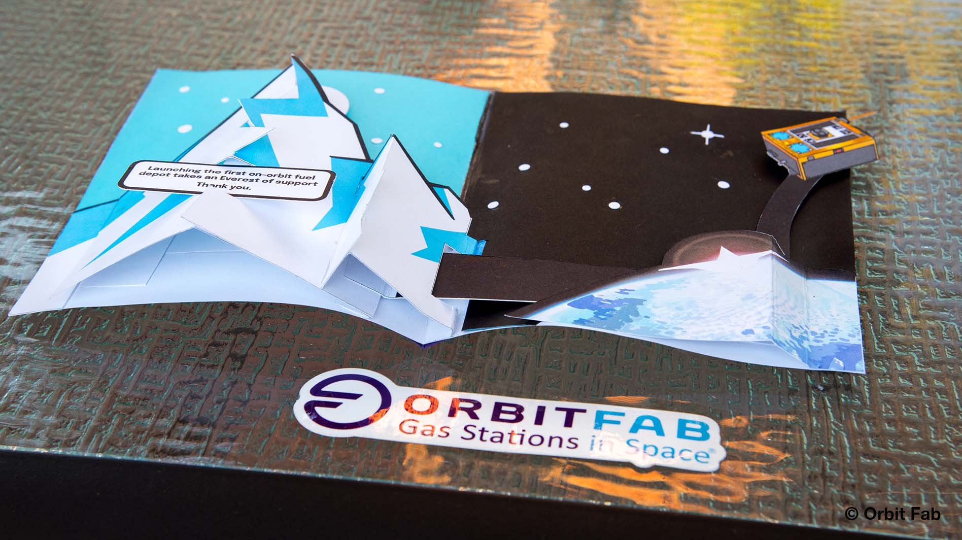 Photo of Paper card that pops up to reveal Mt Everest and Tenzing satellite from Orbit Fab