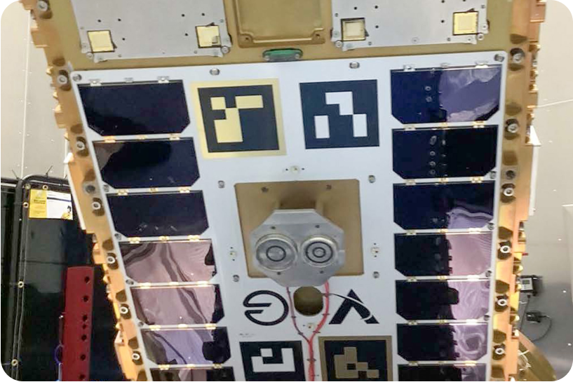 Close up of RAFTI refueling interface on a spacecraft with solar panels